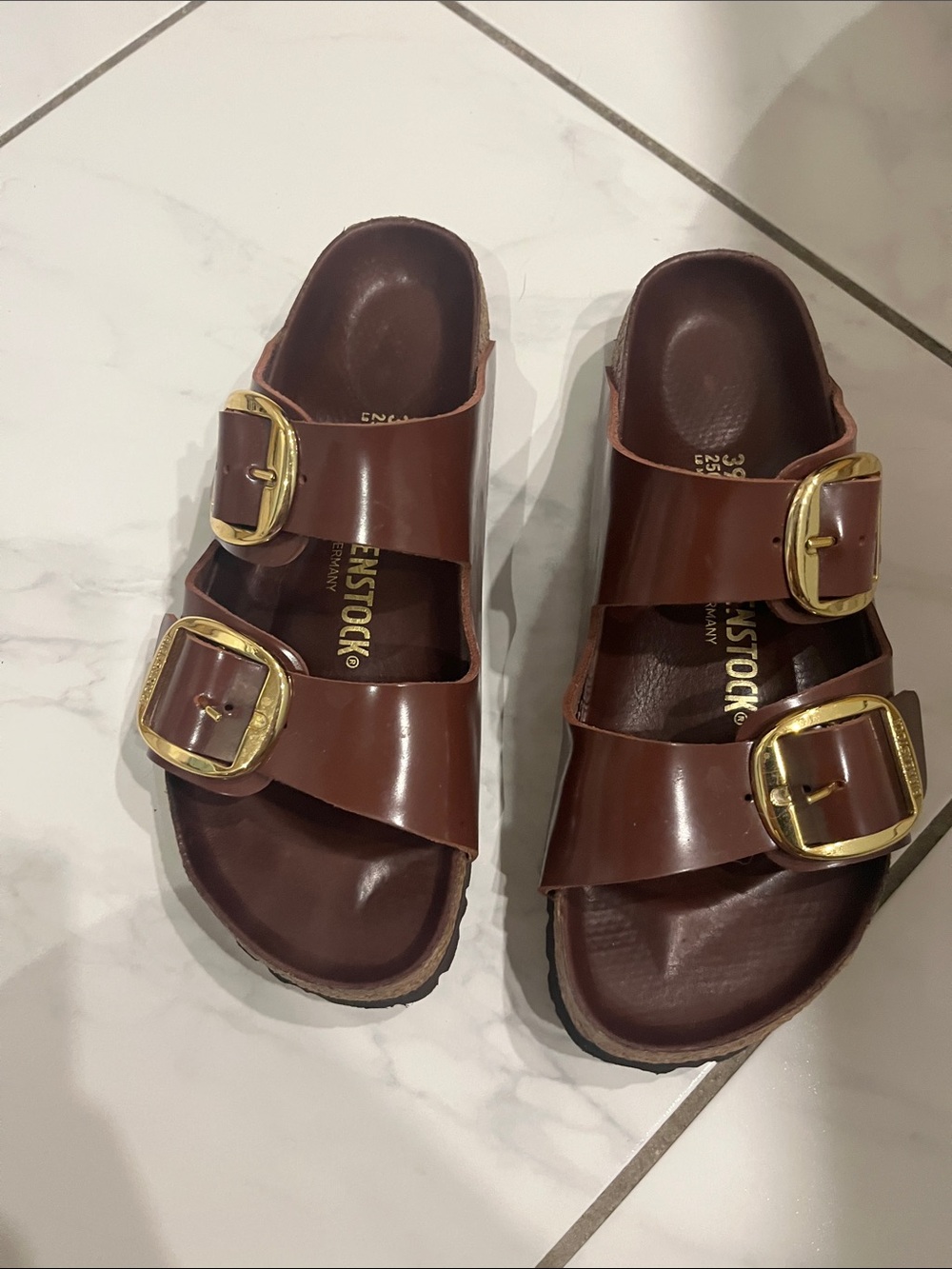 Birkenstocks with gold hardware